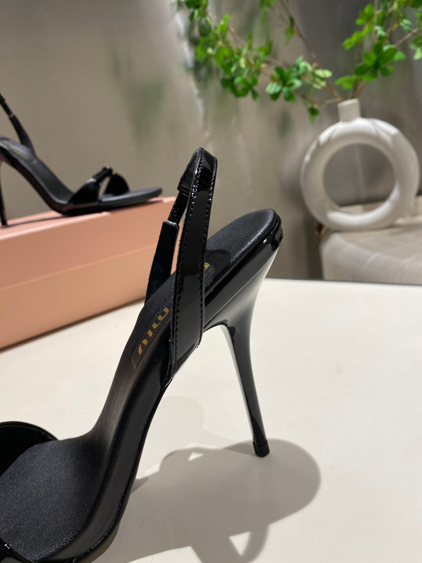 TWO STRAP HIGH HEELED SANDALS IN BLACK GLOSSY SHEEPSKIN