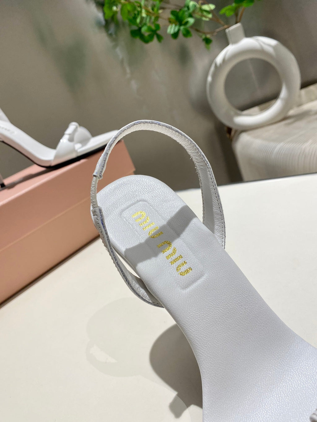 TWO STRAP HIGH HEELED SANDALS IN WHITE GLOSSY SHEEPSKIN