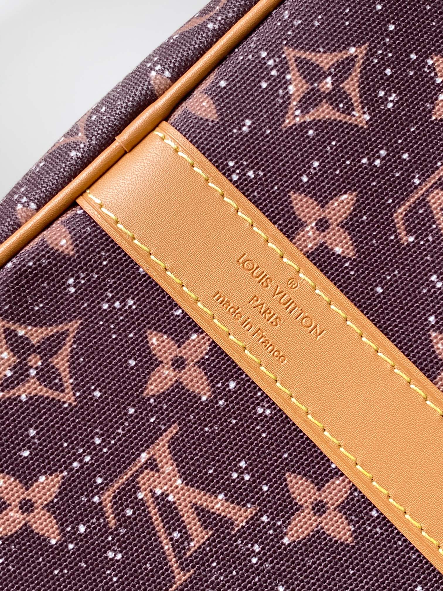 LV 25S KEEPALL 50 MONOGRAM CRYSTALS IN DARK PURPLE CANVAS AND CALFSKIN TRIM