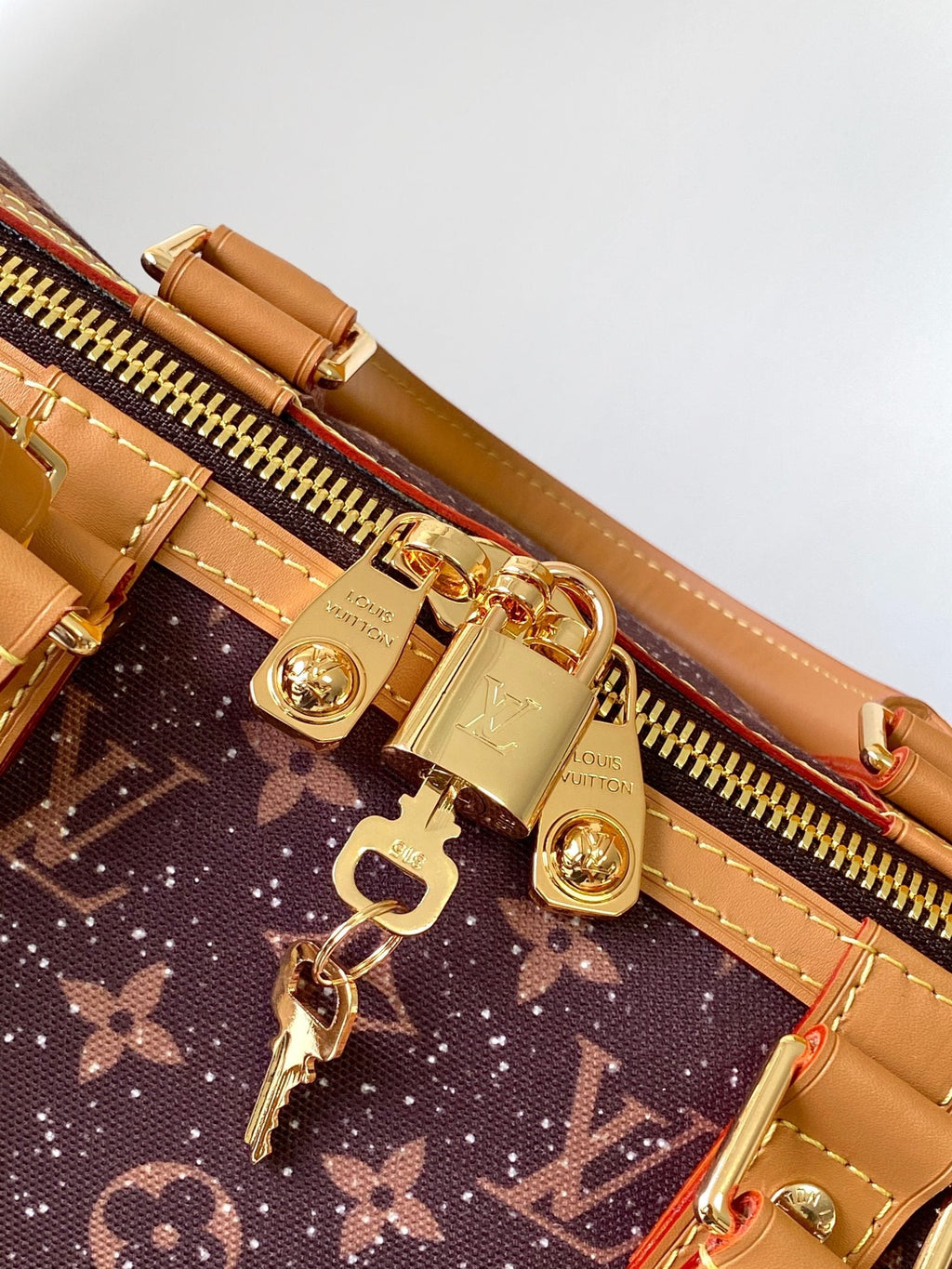 LV 25S KEEPALL 50 MONOGRAM CRYSTALS IN DARK PURPLE CANVAS AND CALFSKIN TRIM