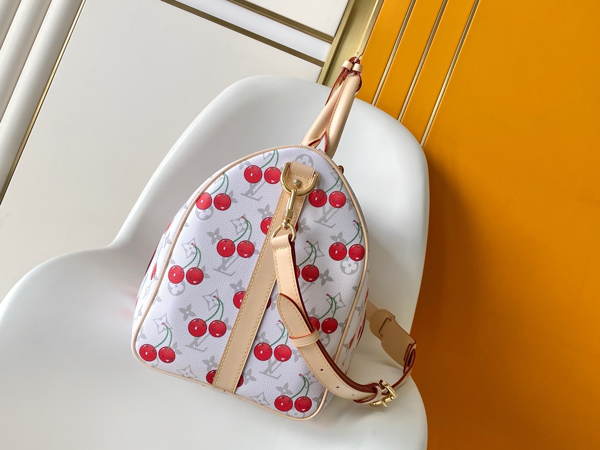 KEEPALL BANDOULIÈRE 45 IN WHITE AND RED CALFSKIN