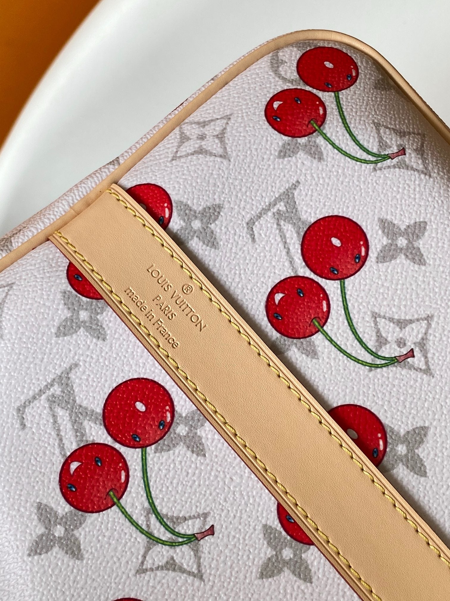 KEEPALL BANDOULIÈRE 45 IN WHITE AND RED CALFSKIN