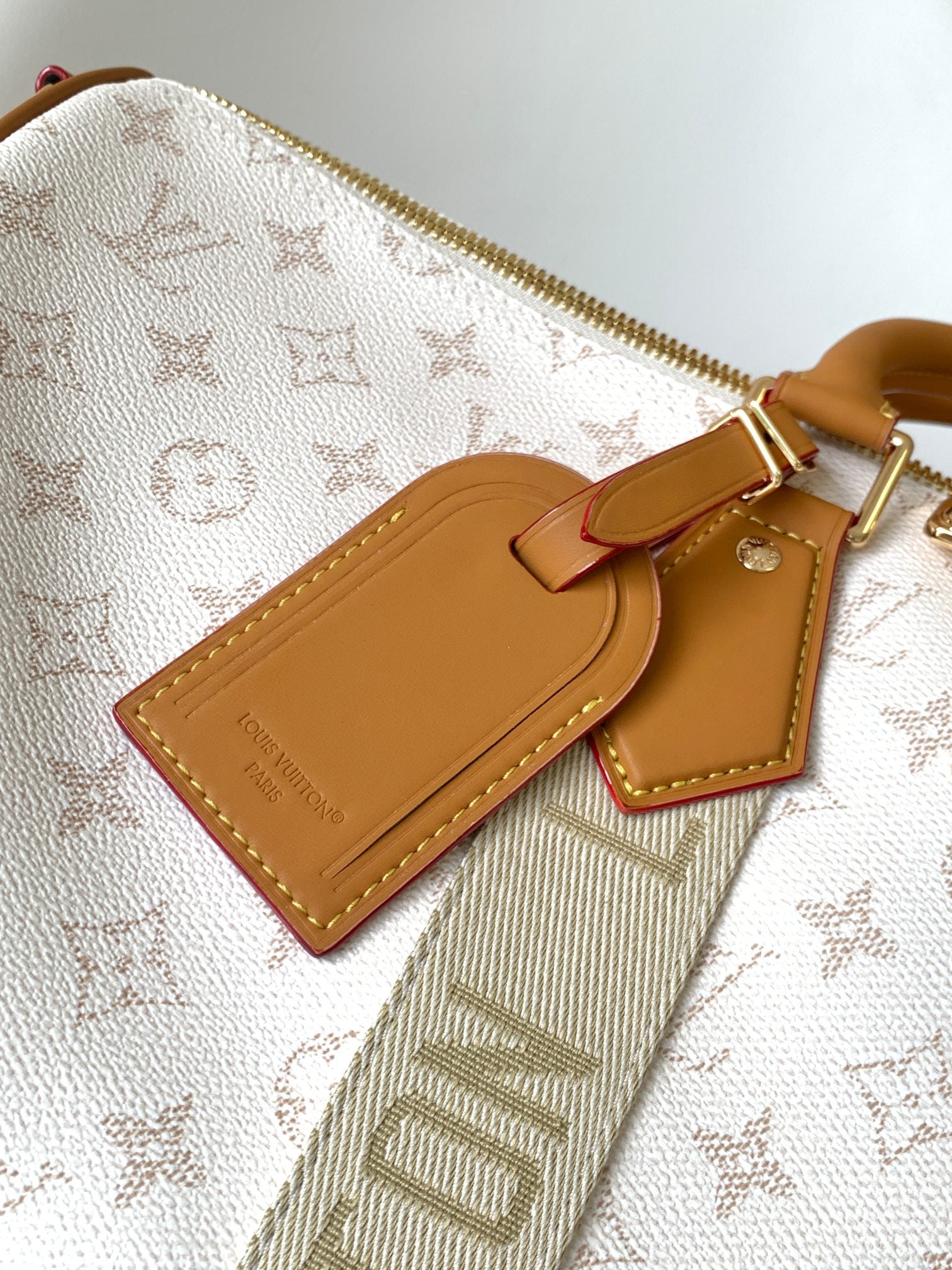 LV 25S KEEPALL BANDOULIÈRE BAG 45 IN WHITE MONOGRAM HERITAGE CALFSKIN