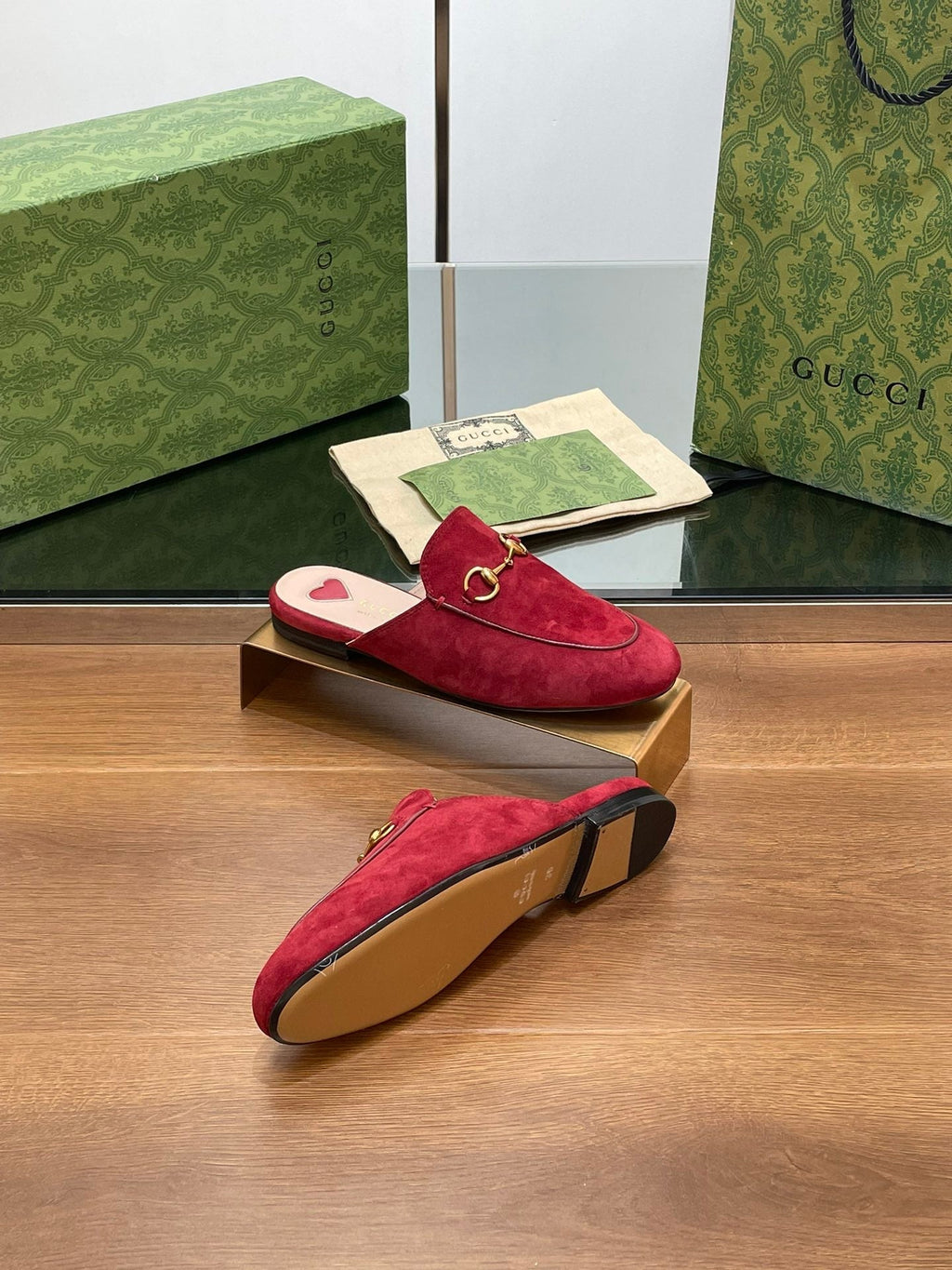 HORSEBIT MULE IN CHERRY RED SUEDE WITH GOLD HARDWARE