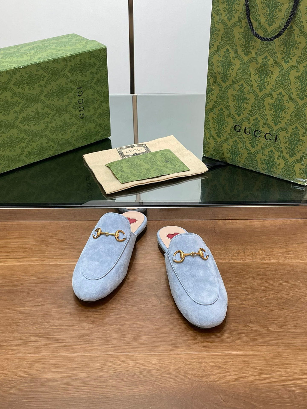 HORSEBIT MULE IN LIGHT BLUE SUEDE WITH GOLD HARDWARE