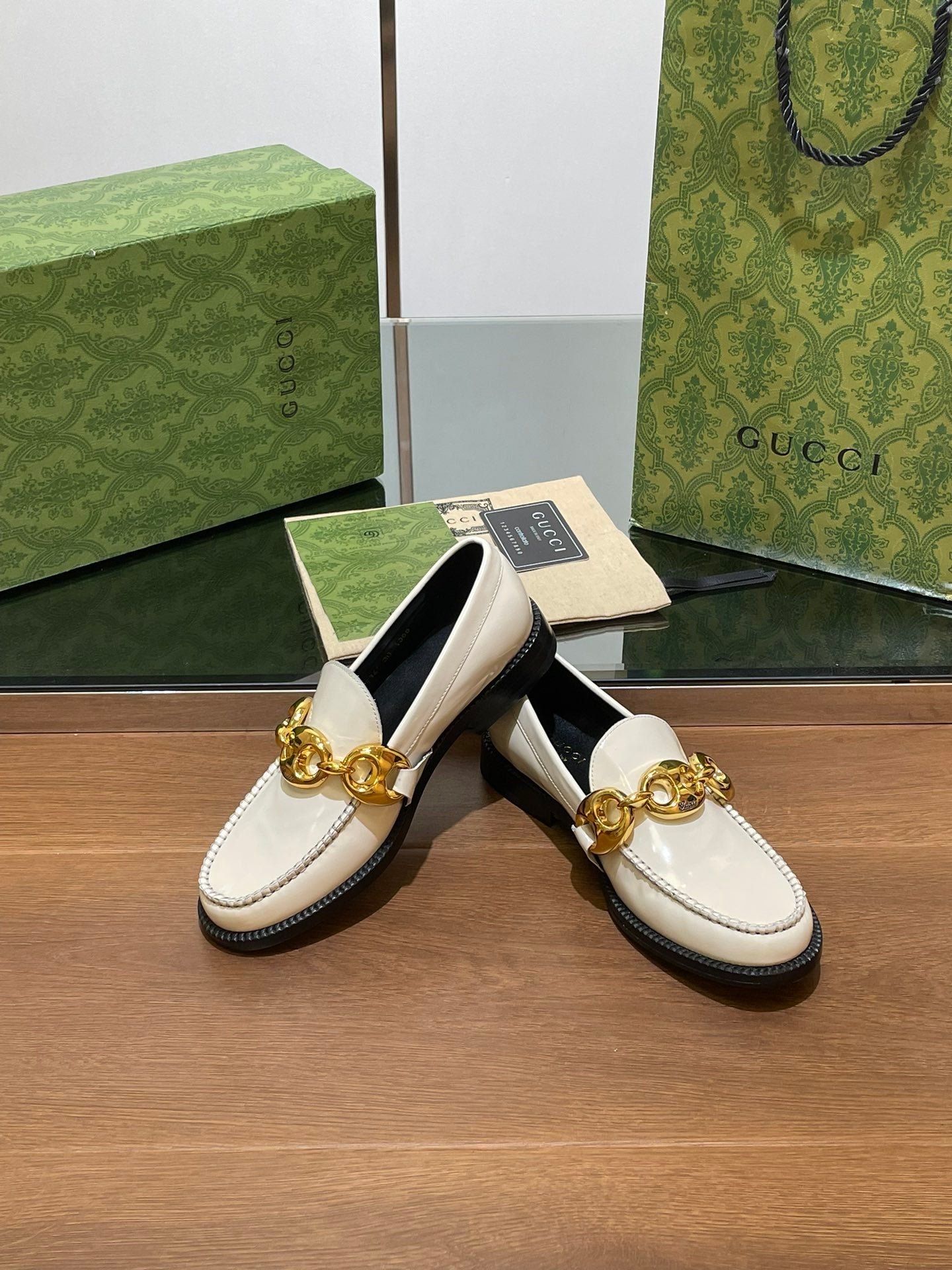 GG LOAFER SHOES IN WHITE CALFSKIN WITH GOLD HARDWARE