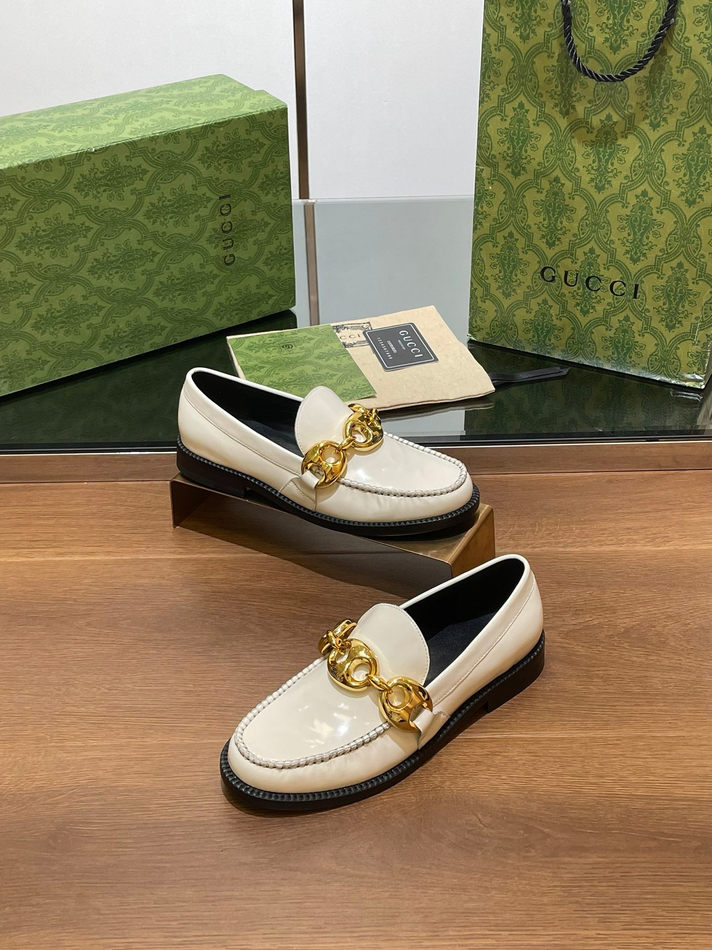 GG LOAFER SHOES IN WHITE CALFSKIN WITH GOLD HARDWARE