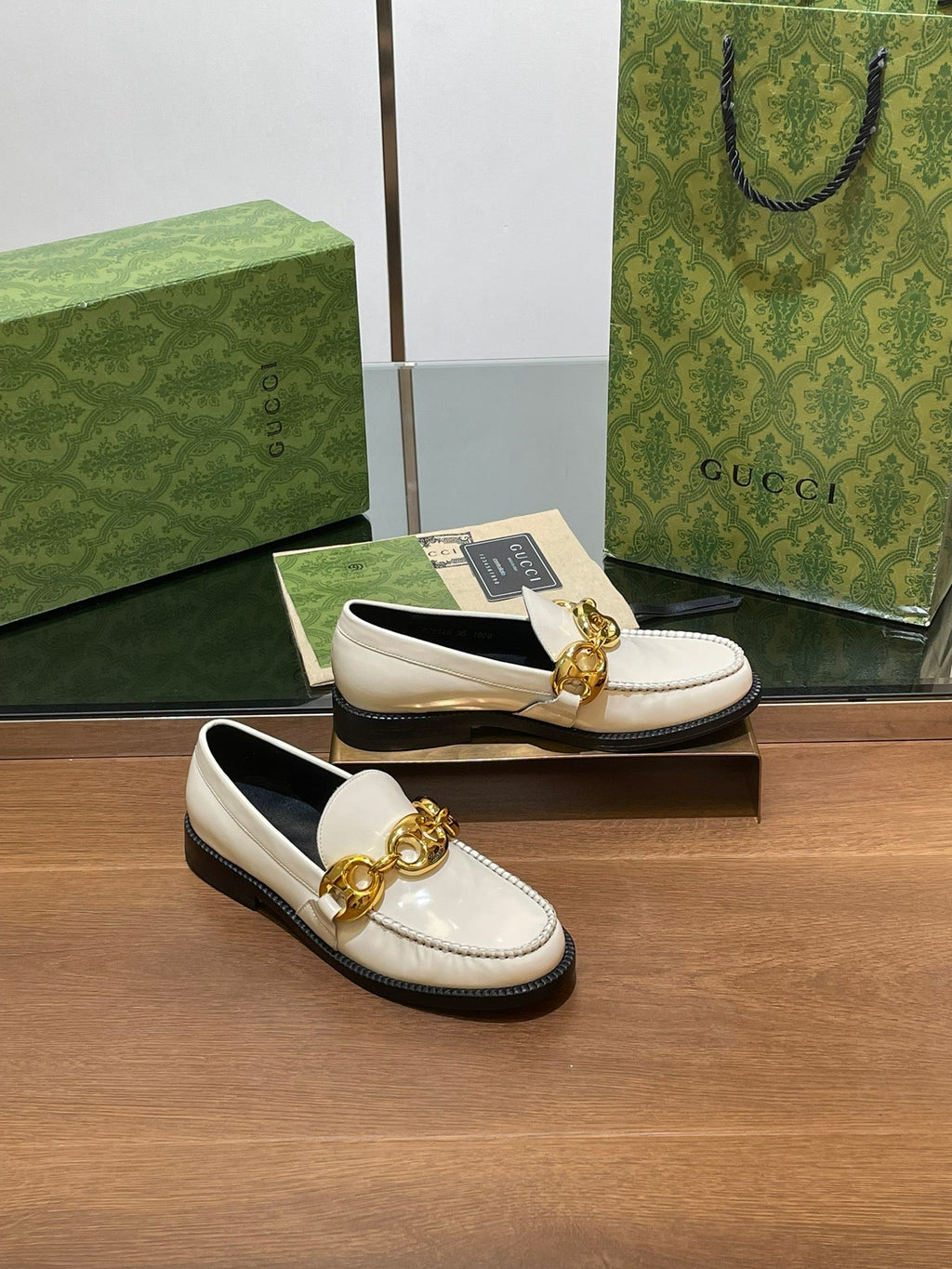 GG LOAFER SHOES IN WHITE CALFSKIN WITH GOLD HARDWARE