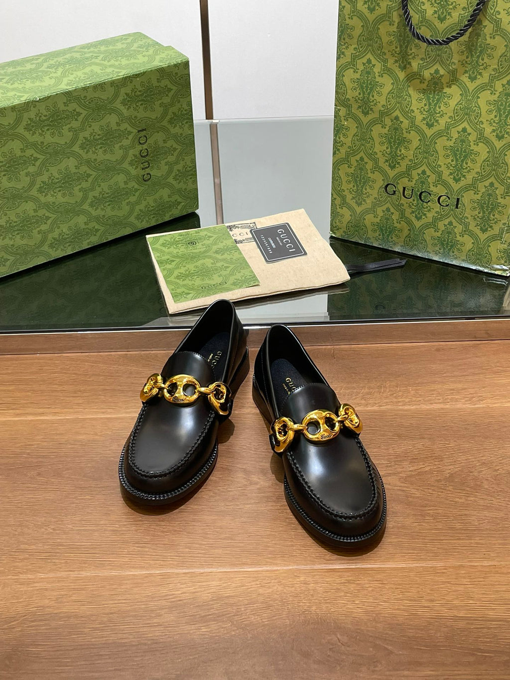 GG LOAFER SHOES IN BLACK CALFSKIN WITH GOLD HARDWARE