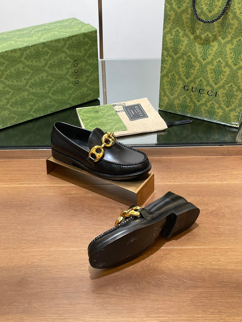 GG LOAFER SHOES IN BLACK CALFSKIN WITH GOLD HARDWARE