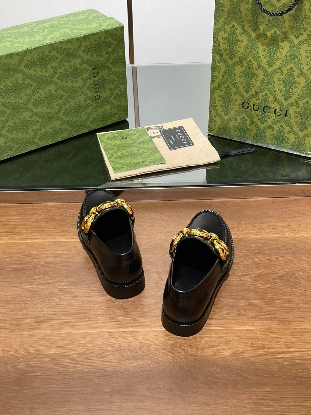 GG LOAFER SHOES IN BLACK CALFSKIN WITH GOLD HARDWARE