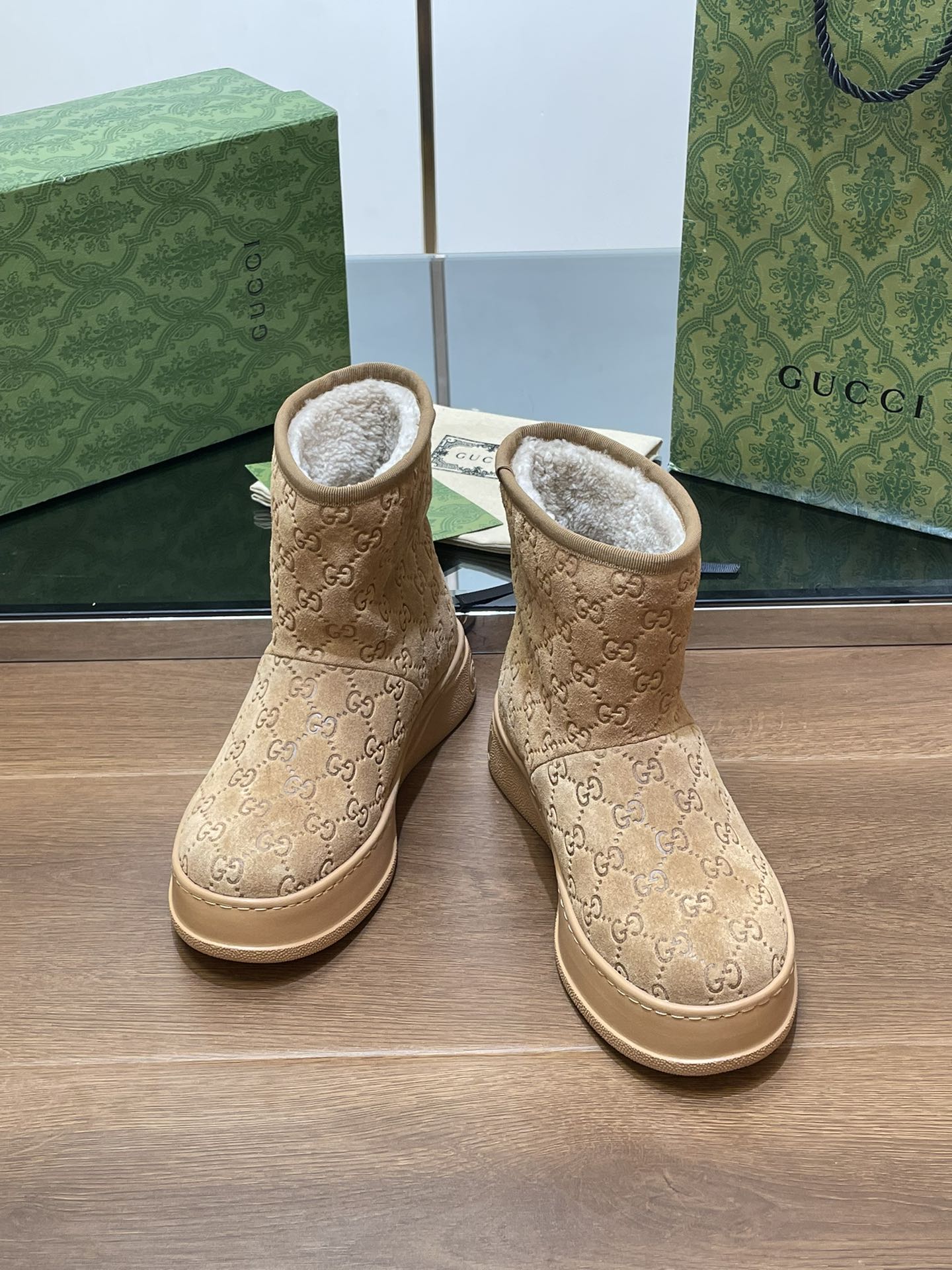 GG UGG BOOTS IN CIDER BROWN EMBOSSED SUEDE AND BEIGE WOOL LINING