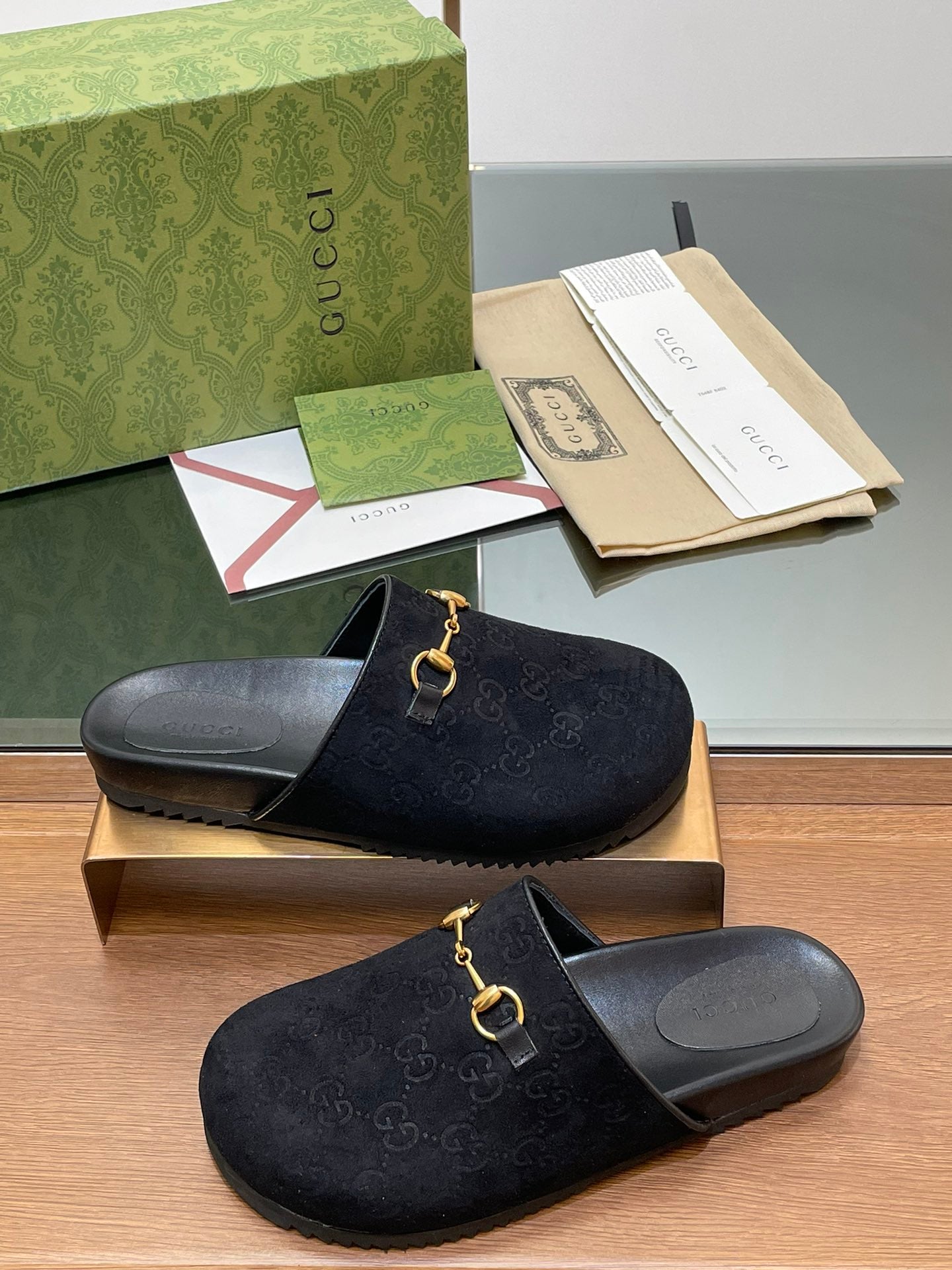 GG HORSEBIT MULE IN BLACK EMBOSSED SUEDE AND SHEEPSKIN LINING