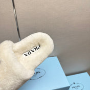 THICK-SOLED FUR SLIDES WHITE WITH TRIANGLE LOGO