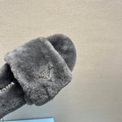 THICK-SOLED FUR SLIDES GRAY WITH TRIANGLE LOGO