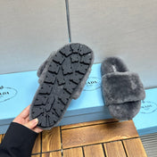 THICK-SOLED FUR SLIDES GRAY WITH TRIANGLE LOGO