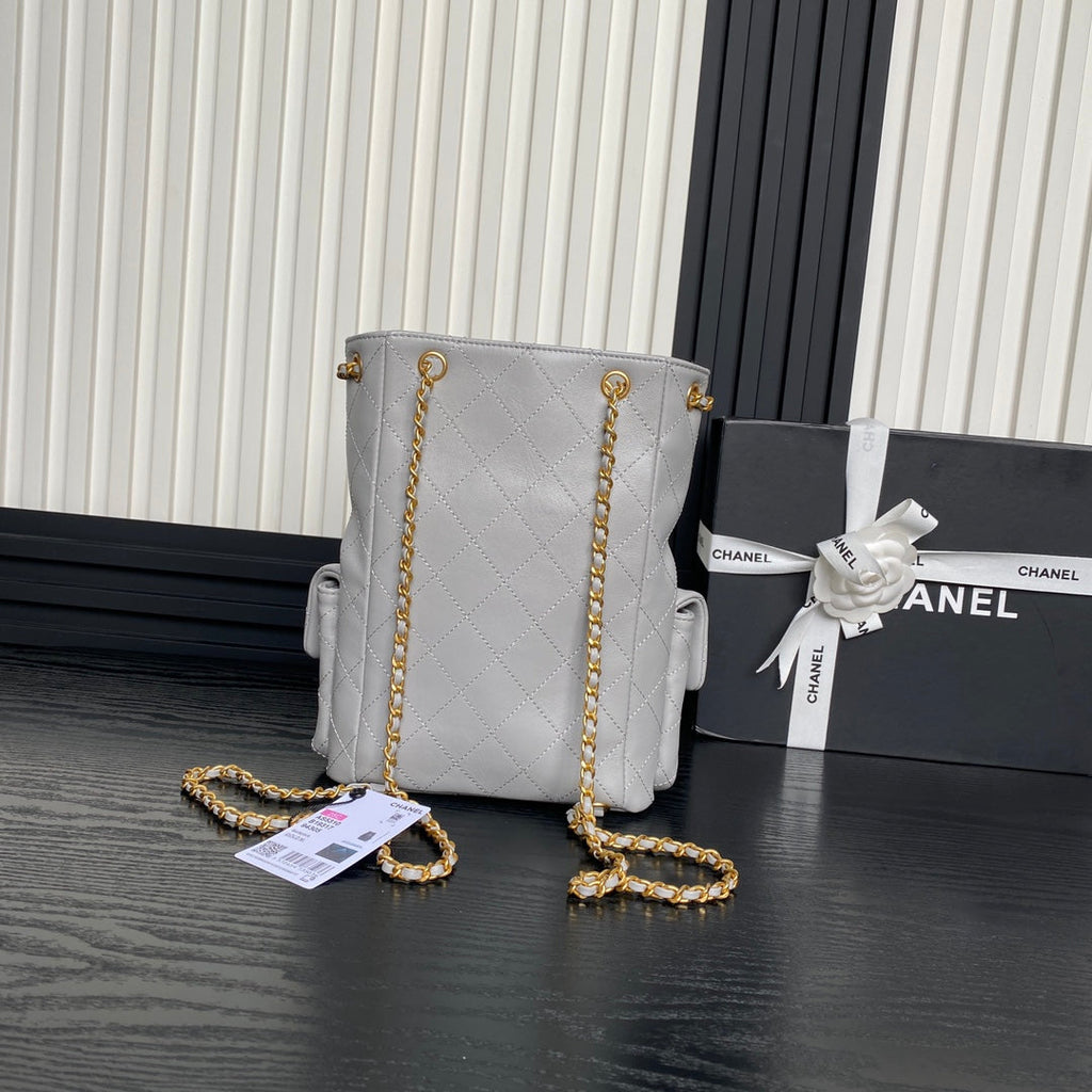 CRUISE DRAWSTRING BACKPACK 24 IN GREY LAMBSKIN GOLD-TONE METALLIC