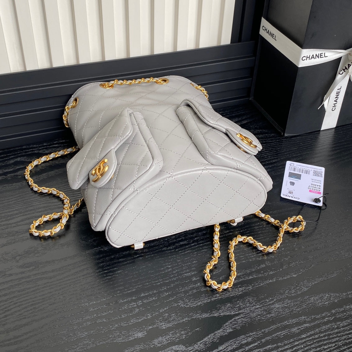 CRUISE DRAWSTRING BACKPACK 24 IN GREY LAMBSKIN GOLD-TONE METALLIC