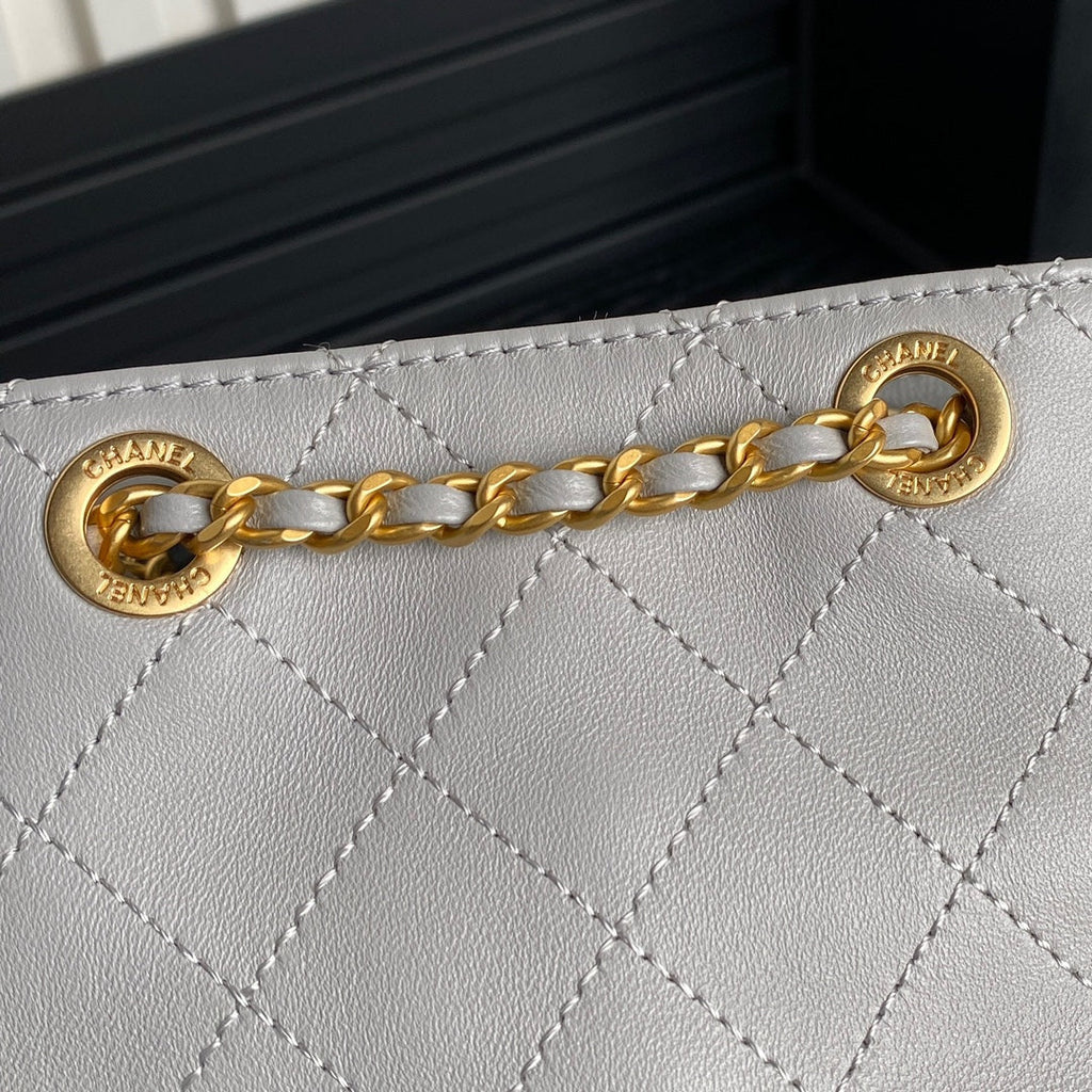 CRUISE DRAWSTRING BACKPACK 24 IN GREY LAMBSKIN GOLD-TONE METALLIC