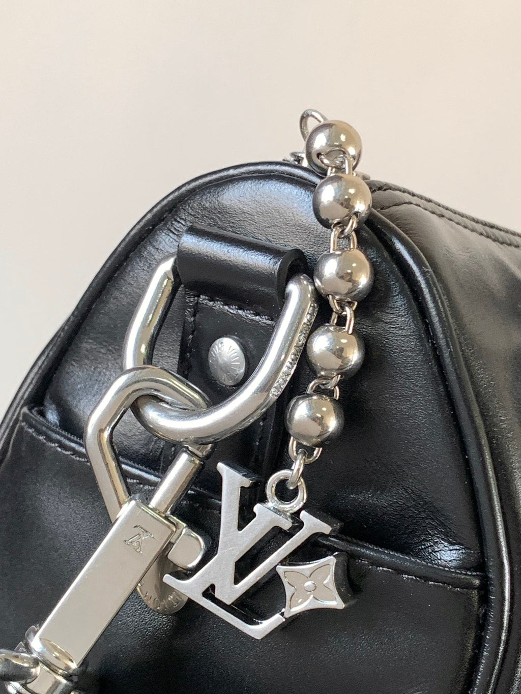 LV 25S KEEPALL CARGO BANDOULIÈRE 25 IN BLACK CALFSKIN SILVER HARDWARE