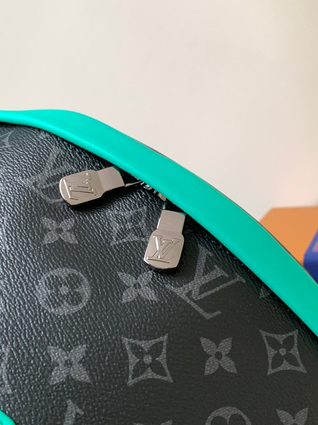 LV 25S DISCOVERY BUMBAG 44 IN BLACK AQUA MONOGRAM ECLIPSE CANVAS AND CALFSKIN