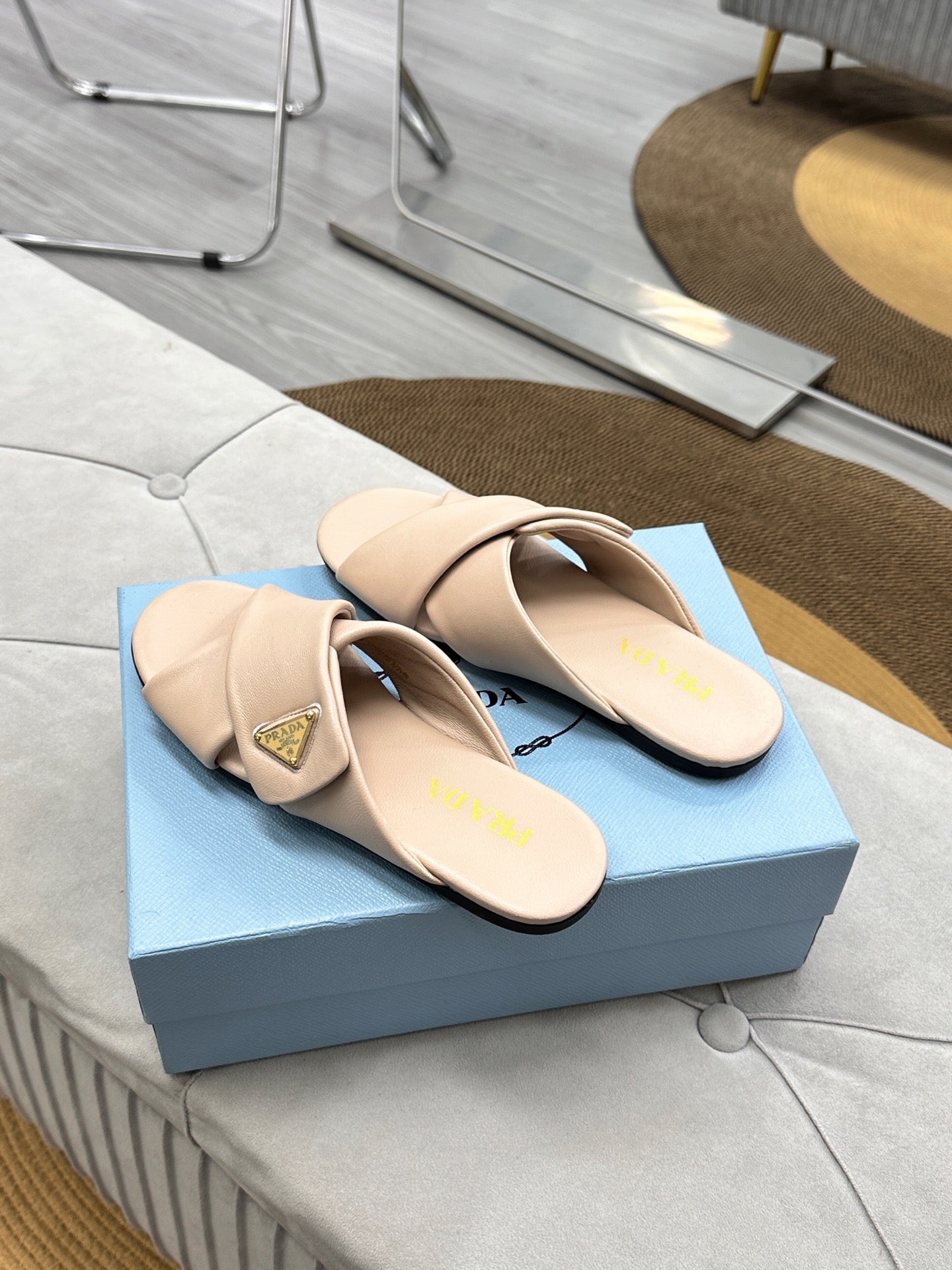 PRADA 25S SLIDE SANDALS IN BEIGE CALFSKIN LOGO