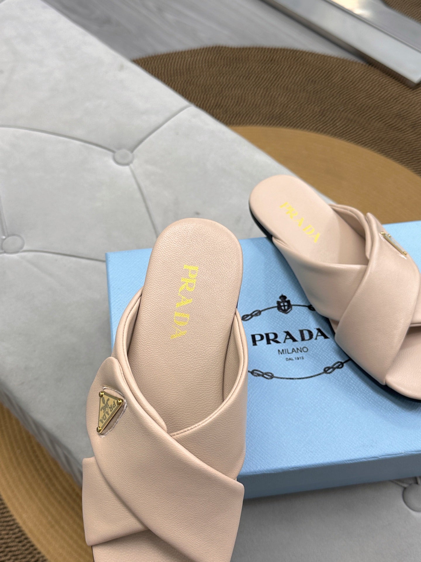 PRADA 25S SLIDE SANDALS IN BEIGE CALFSKIN LOGO