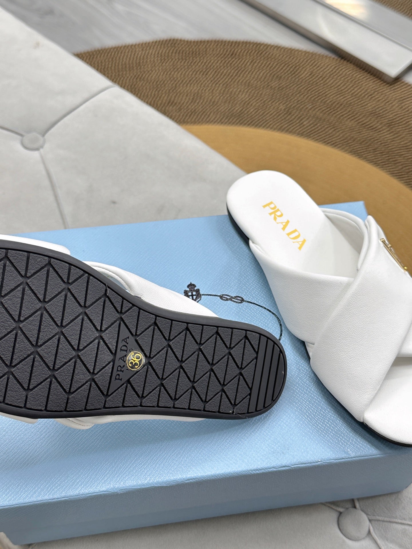 PRADA 25S SLIDE SANDALS IN WHITE CALFSKIN LOGO