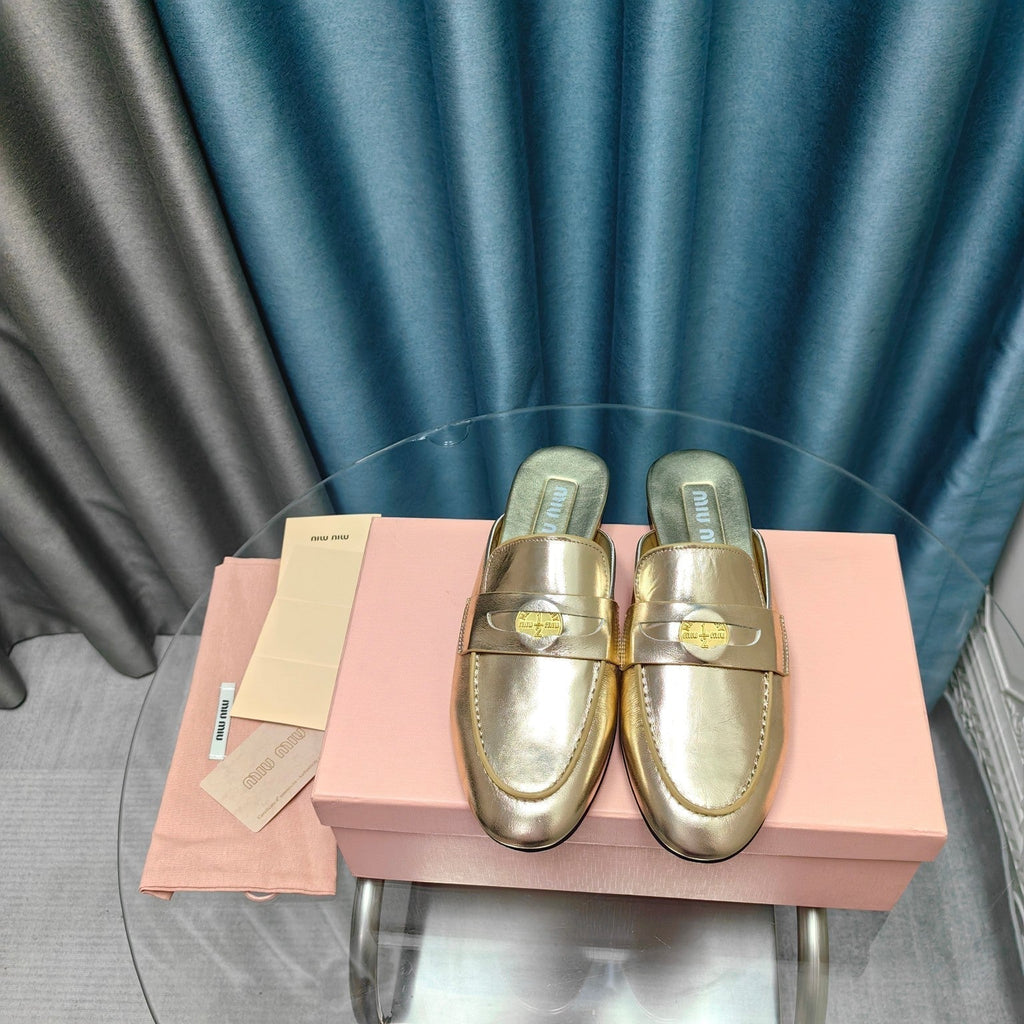 MULES SLIPPERS METALLIC GOLD COWHIDE WITH GOLD COIN
