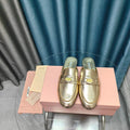 MULES SLIPPERS METALLIC GOLD COWHIDE WITH GOLD COIN