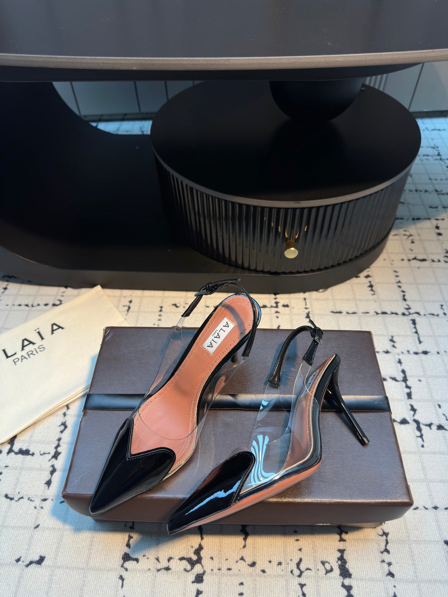 ALAIA HIGH SLINGBACK 25S 90 MM IN BLACK CALFSKIN