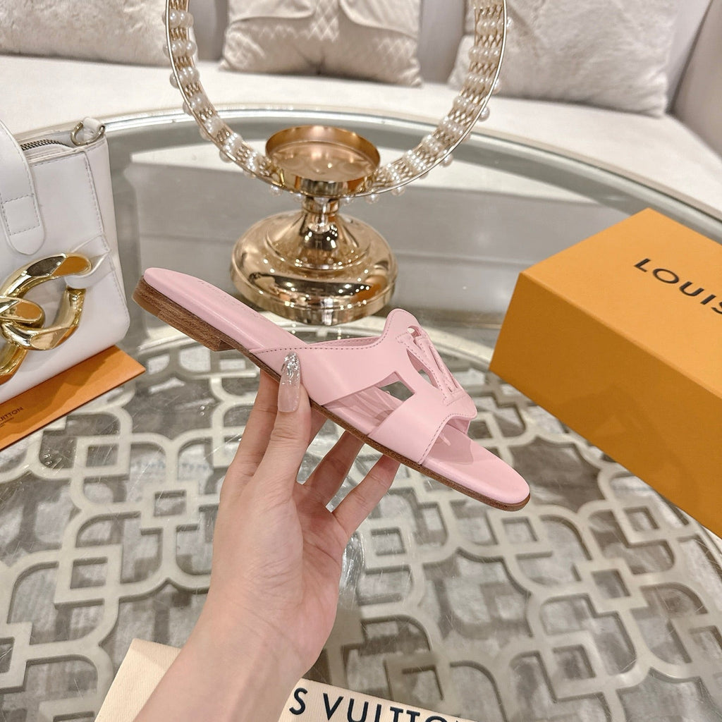 ISOLA FLAT SLIDE IN PASTEL PINK CALFSKIN