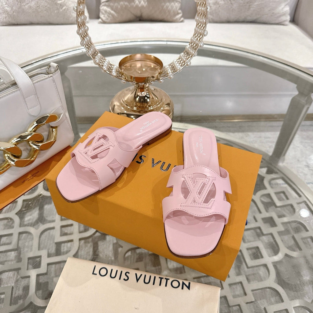 ISOLA FLAT SLIDE IN PASTEL PINK CALFSKIN