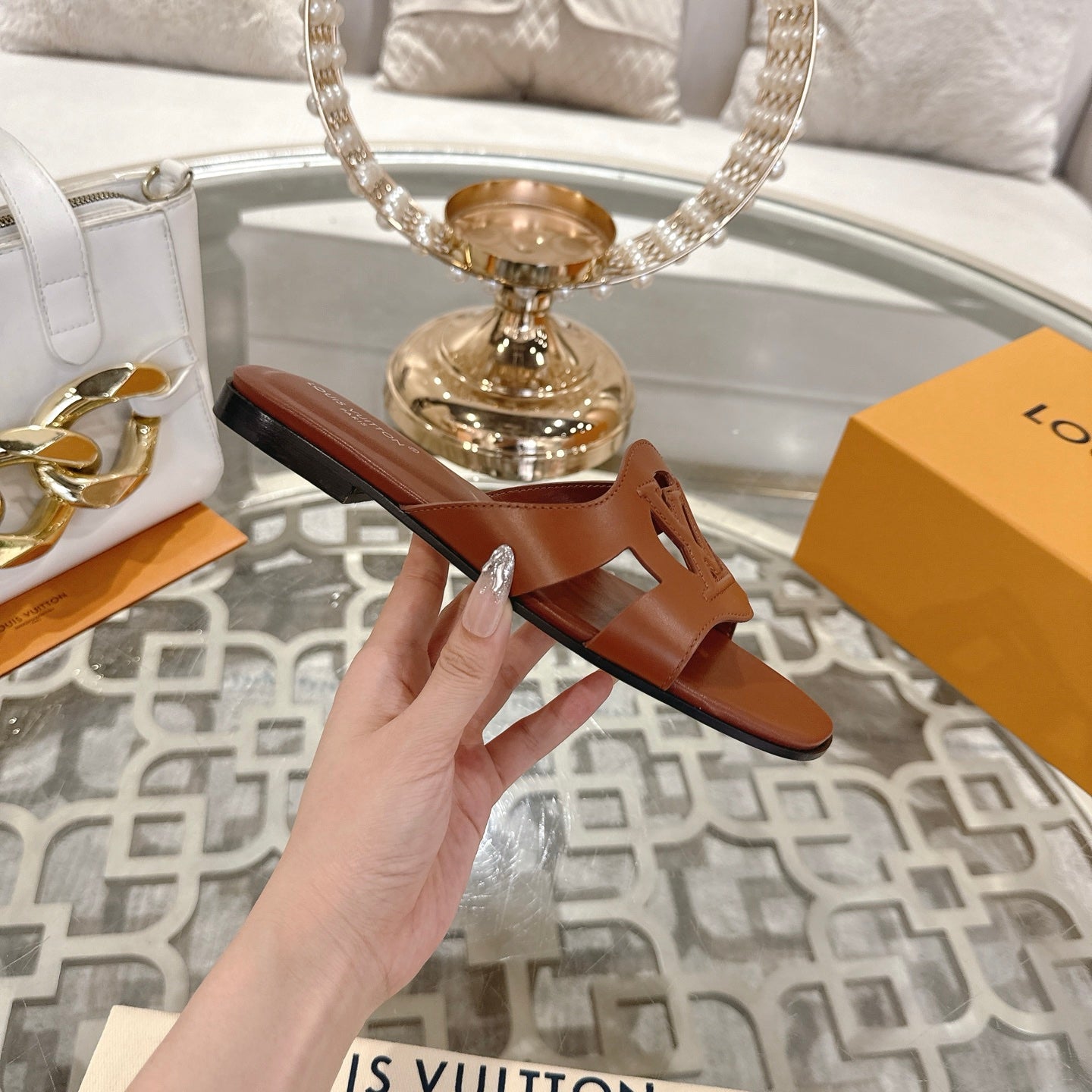 ISOLA FLAT SLIDE IN PENNY BROWN CALFSKIN