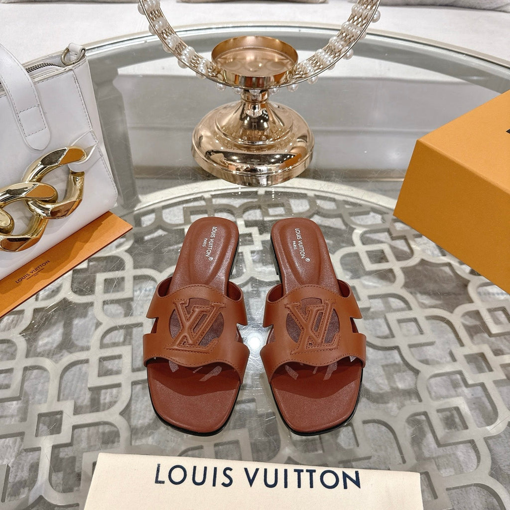 ISOLA FLAT SLIDE IN PENNY BROWN CALFSKIN