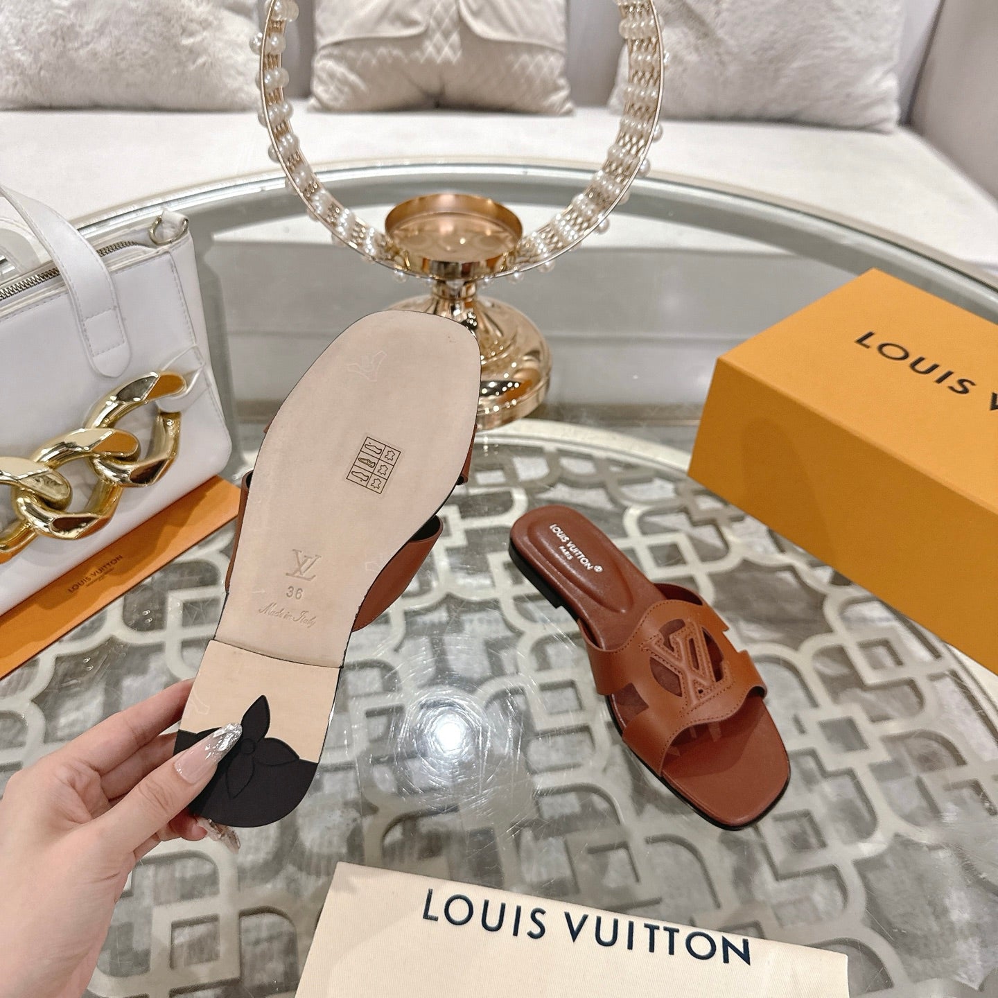 ISOLA FLAT SLIDE IN PENNY BROWN CALFSKIN