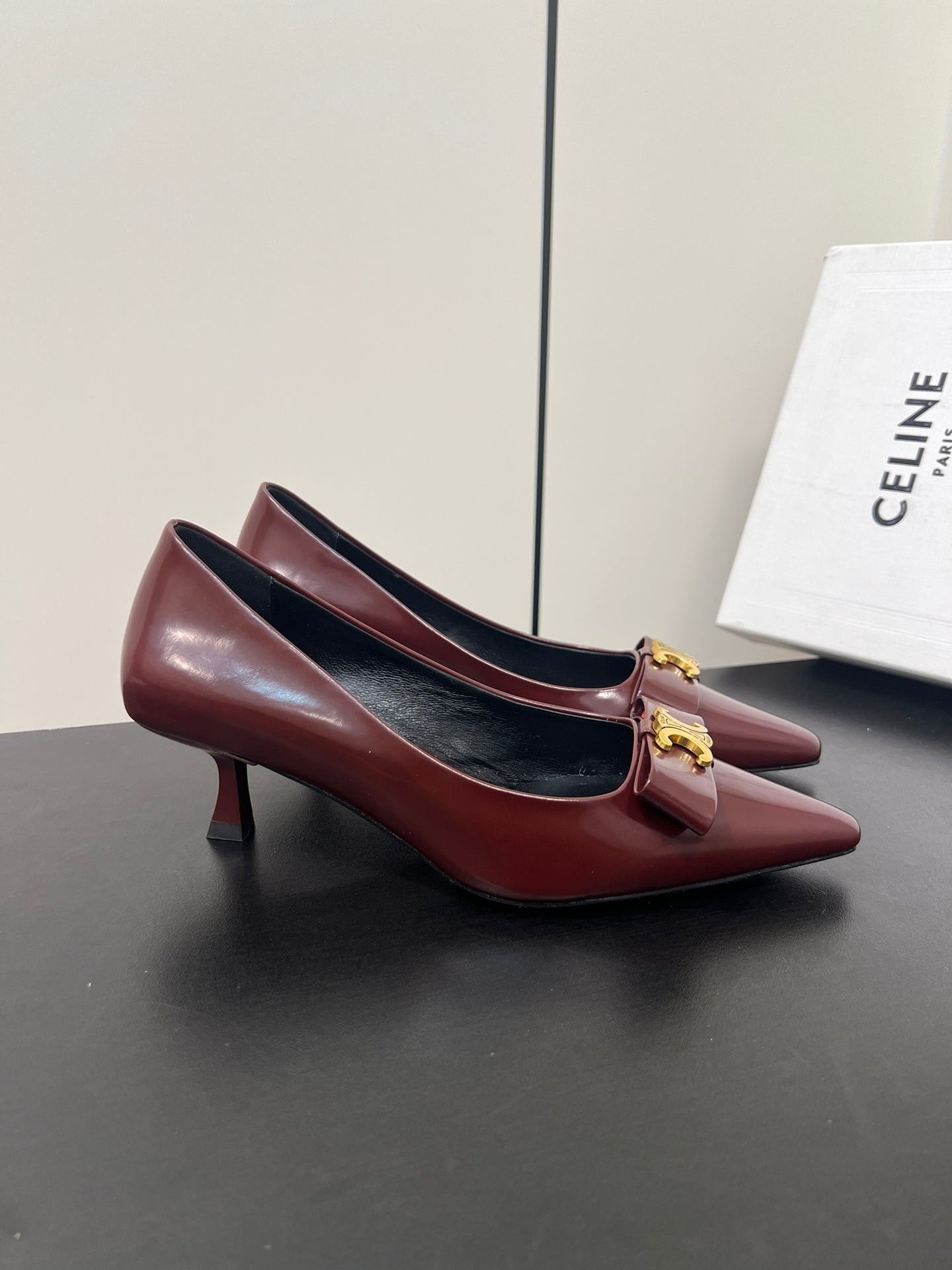TRIOMPHE POINTED-TOE HIGH PUMPS IN BURGUNDY RED SHINY CALFSKIN