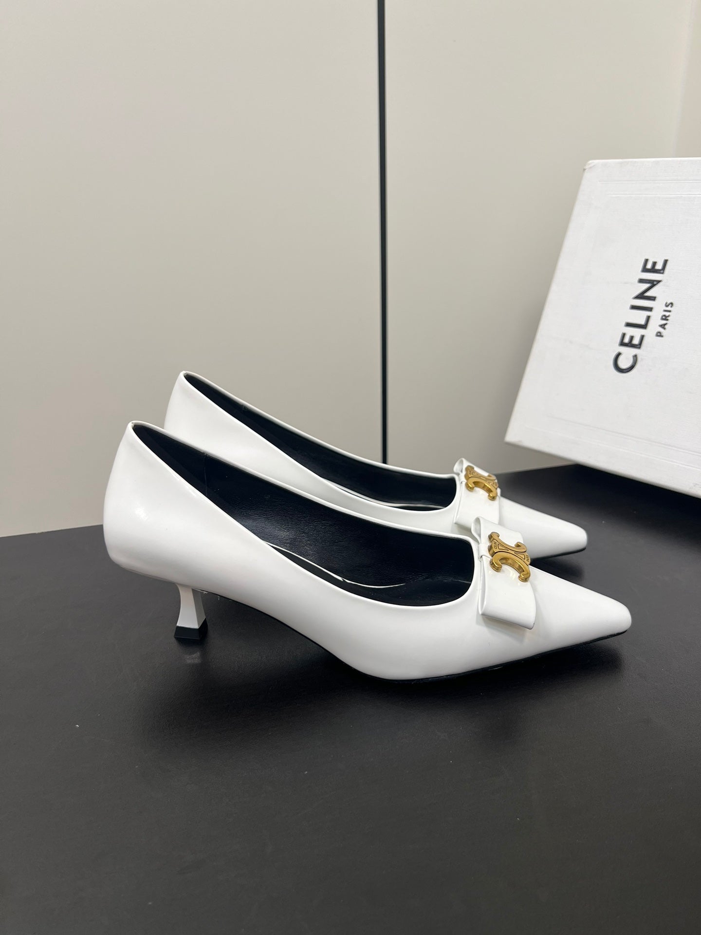 TRIOMPHE POINTED-TOE HIGH PUMPS IN WHITE SHINY CALFSKIN