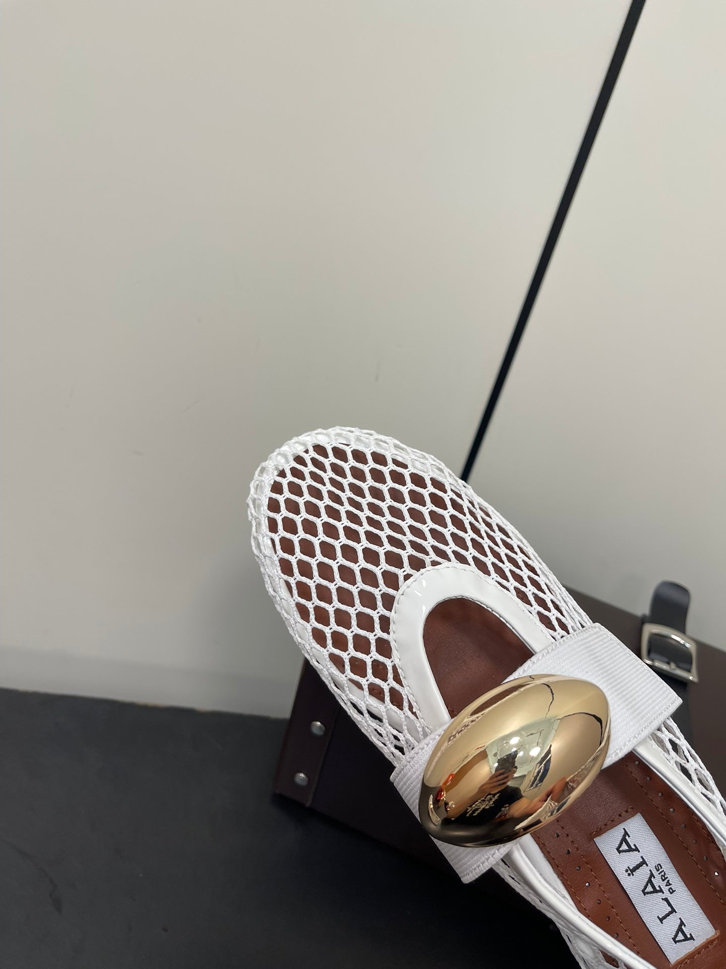 ALAIA BALLET FLATS IN WHITE MESH FISHNET WITH GOLD HARDWARE