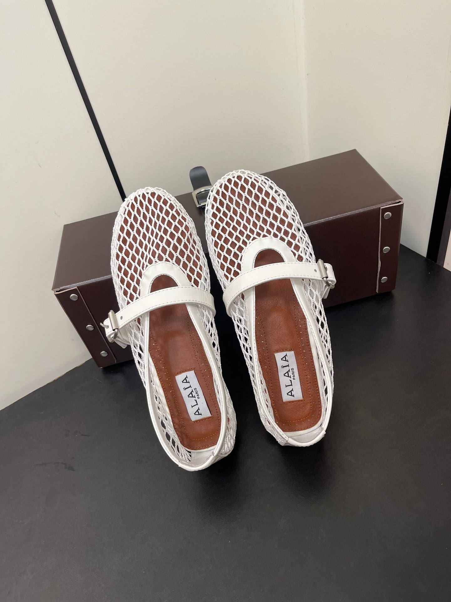 ALAIA BALLET FLATS IN WHITE MESH FISHNET