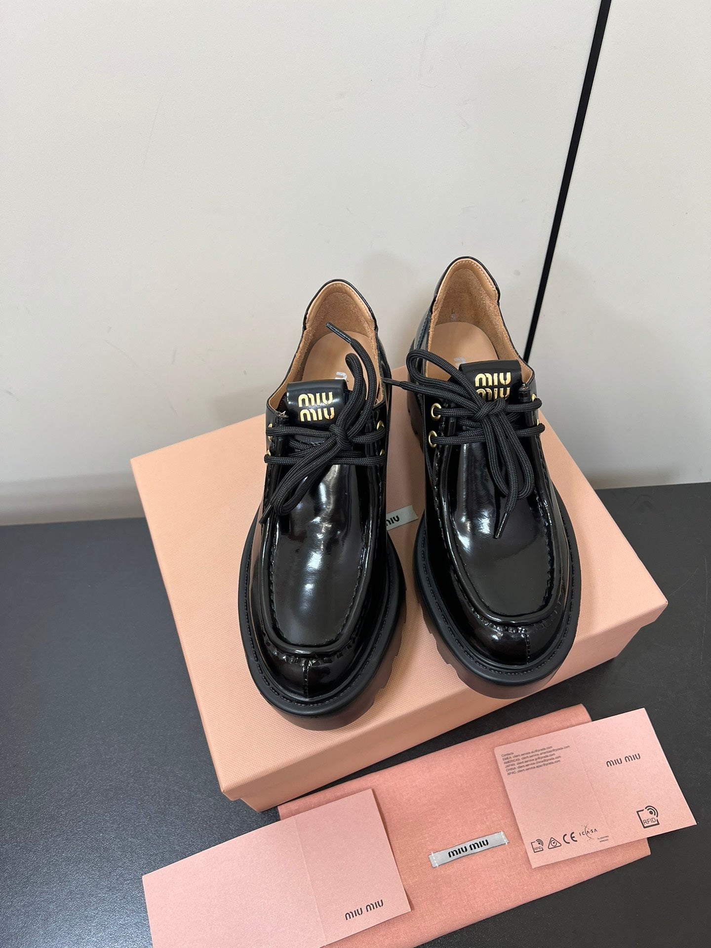 LACE-UP LOAFERS WITH THICK SOLE IN BLACK SHINY SHEEPSKIN