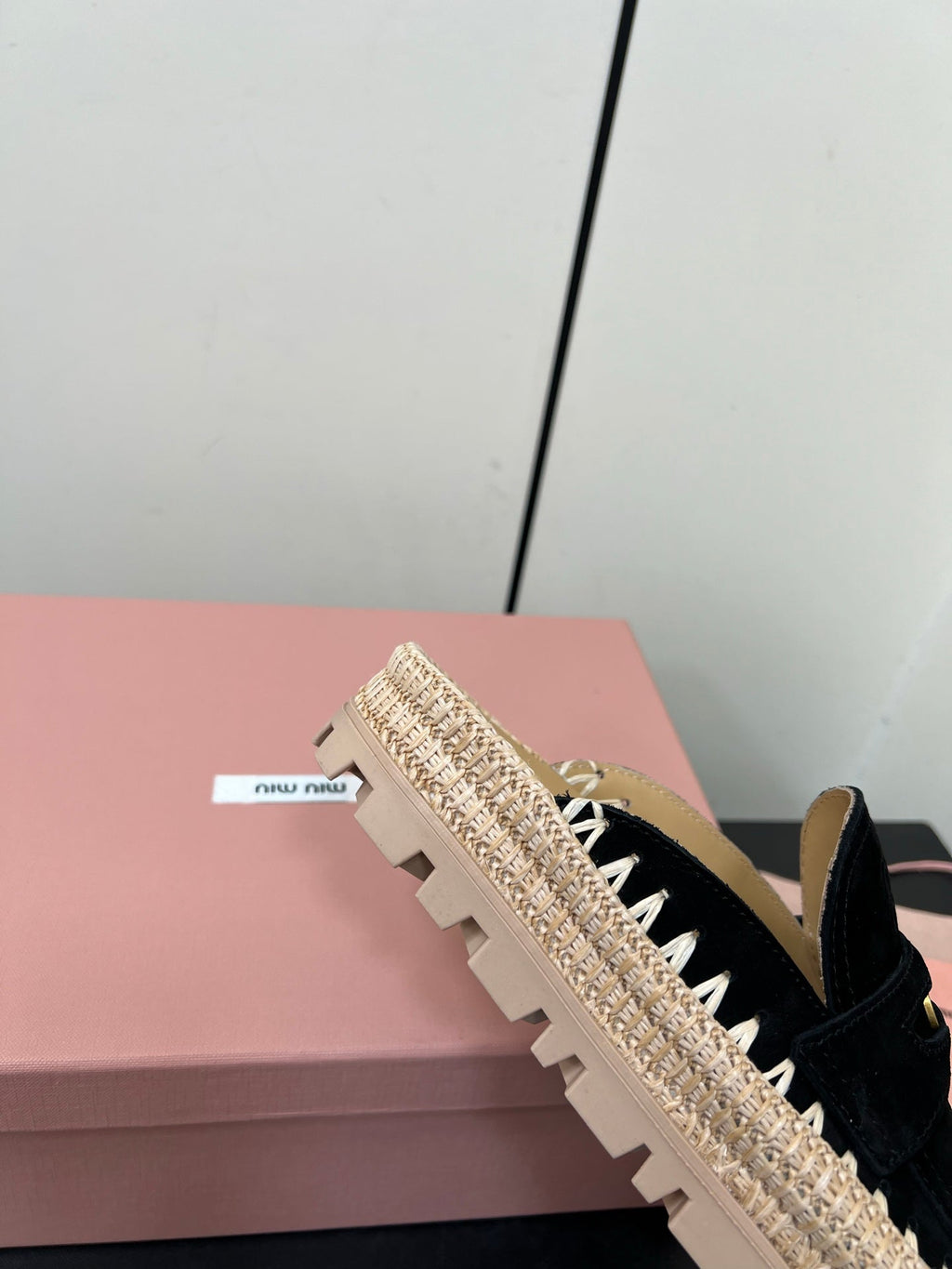 MULES SLIPPERS IN BLACK SUEDE WITH GOLD COIN