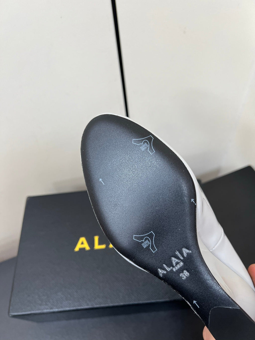 ALAIA WEDGE MULES 25S IN WHITE LAMBSKIN