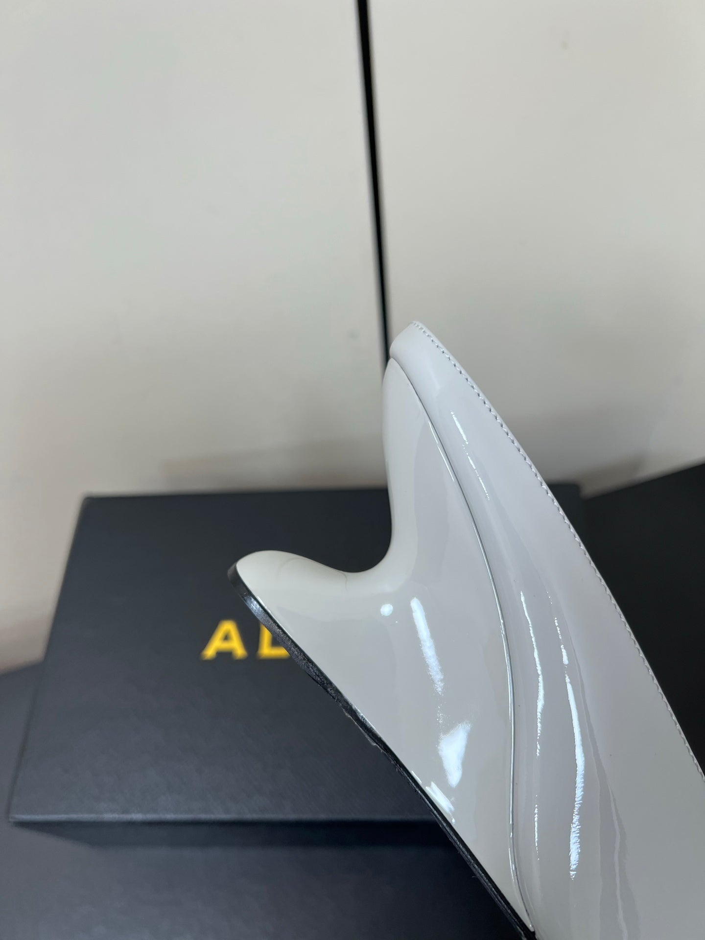 ALAIA WEDGE MULES 25S IN WHITE LAMBSKIN