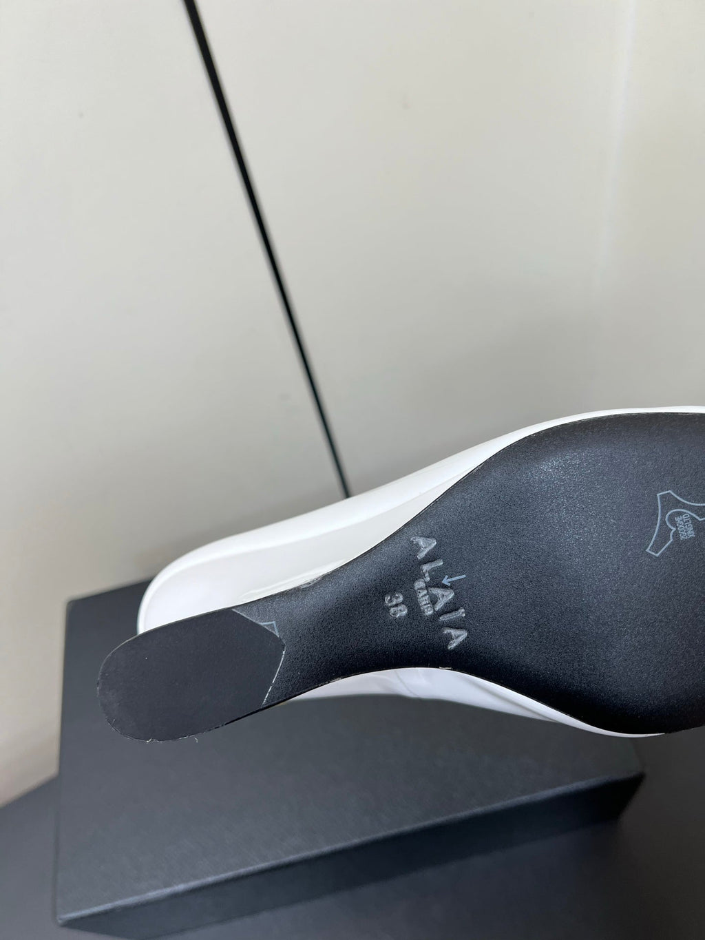 ALAIA WEDGE MULES 25S IN CREAM WHITE LAMBSKIN