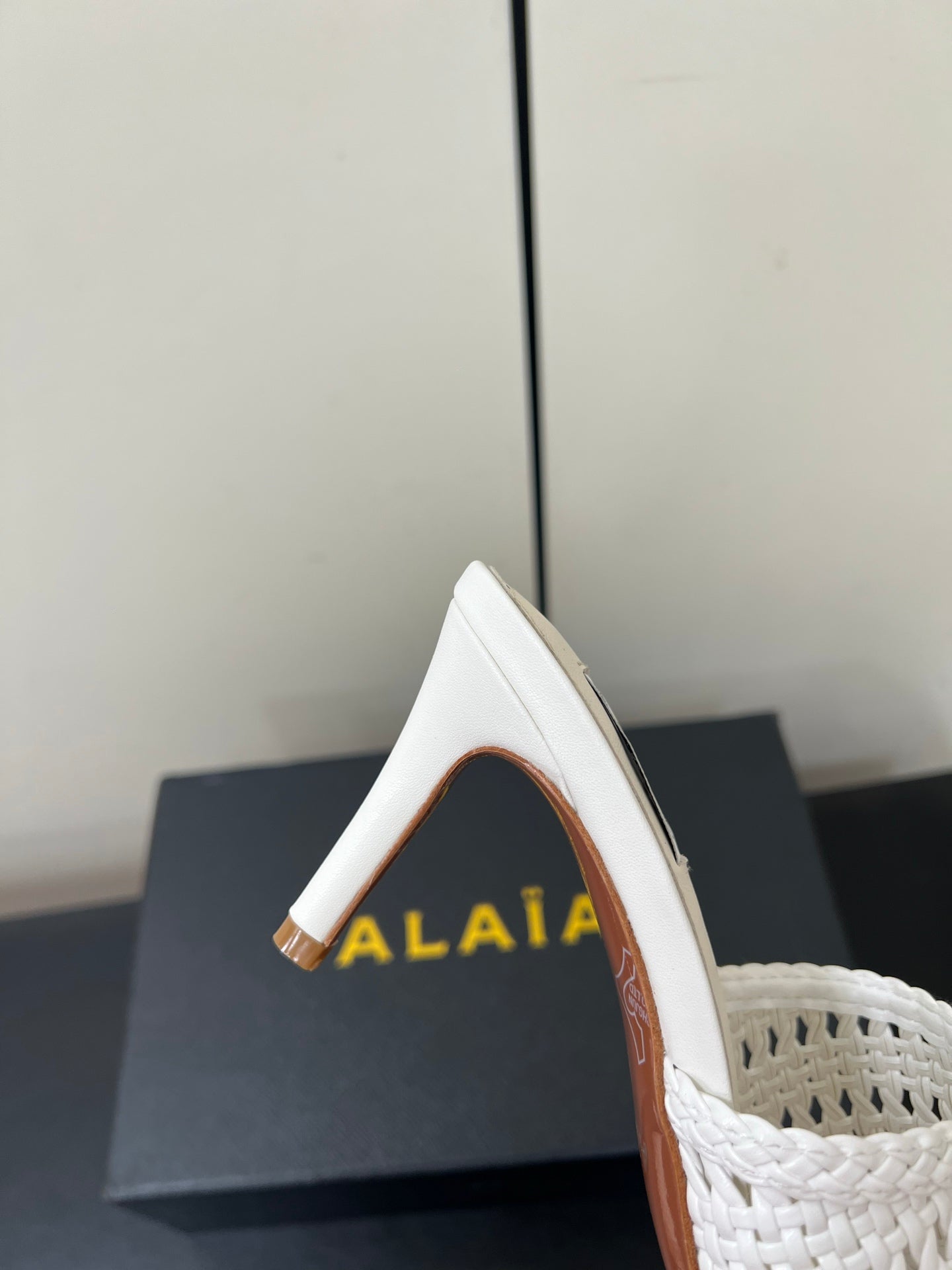 ALAIA HIGH HEEL 25S 70 MM IN WHITE LAMBSKIN WITH WOVEN PATTERN
