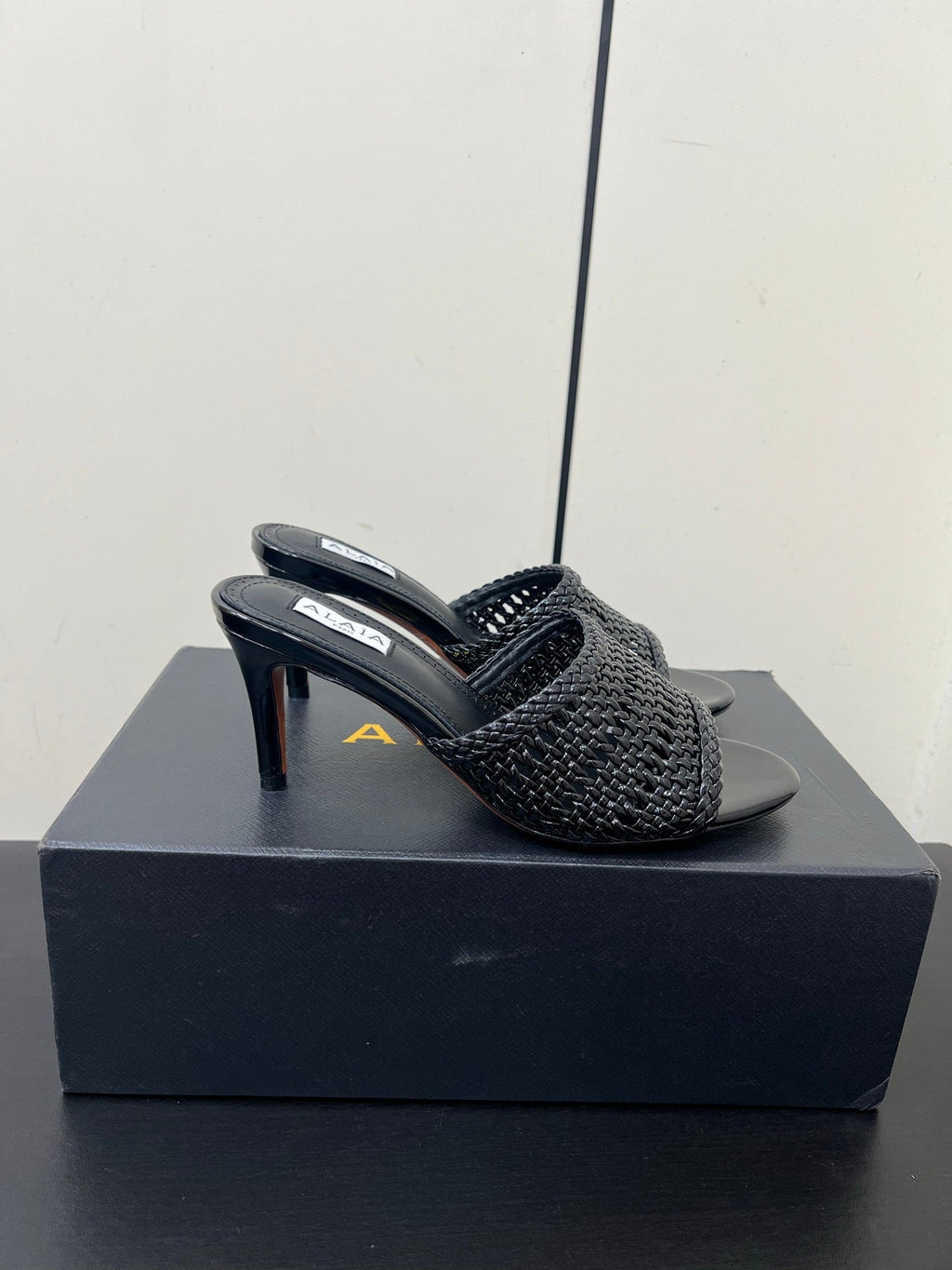ALAIA HIGH HEEL 25S 70 MM IN BLACK LAMBSKIN WITH WOVEN PATTERN