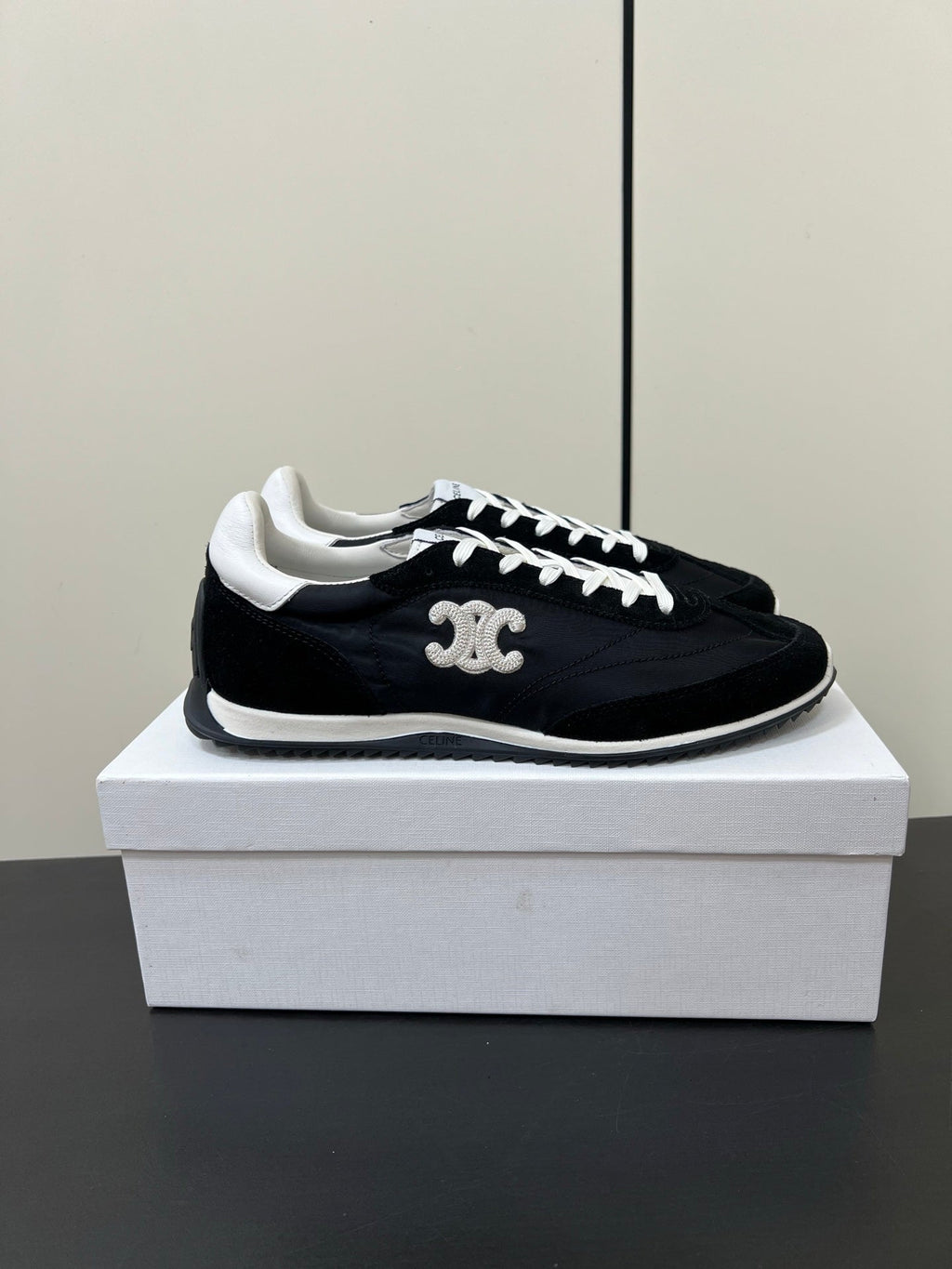 CELINE 25S RACER FORREST GUMP SNEAKERS IN BLACK MERCERIZED CALFSKIN