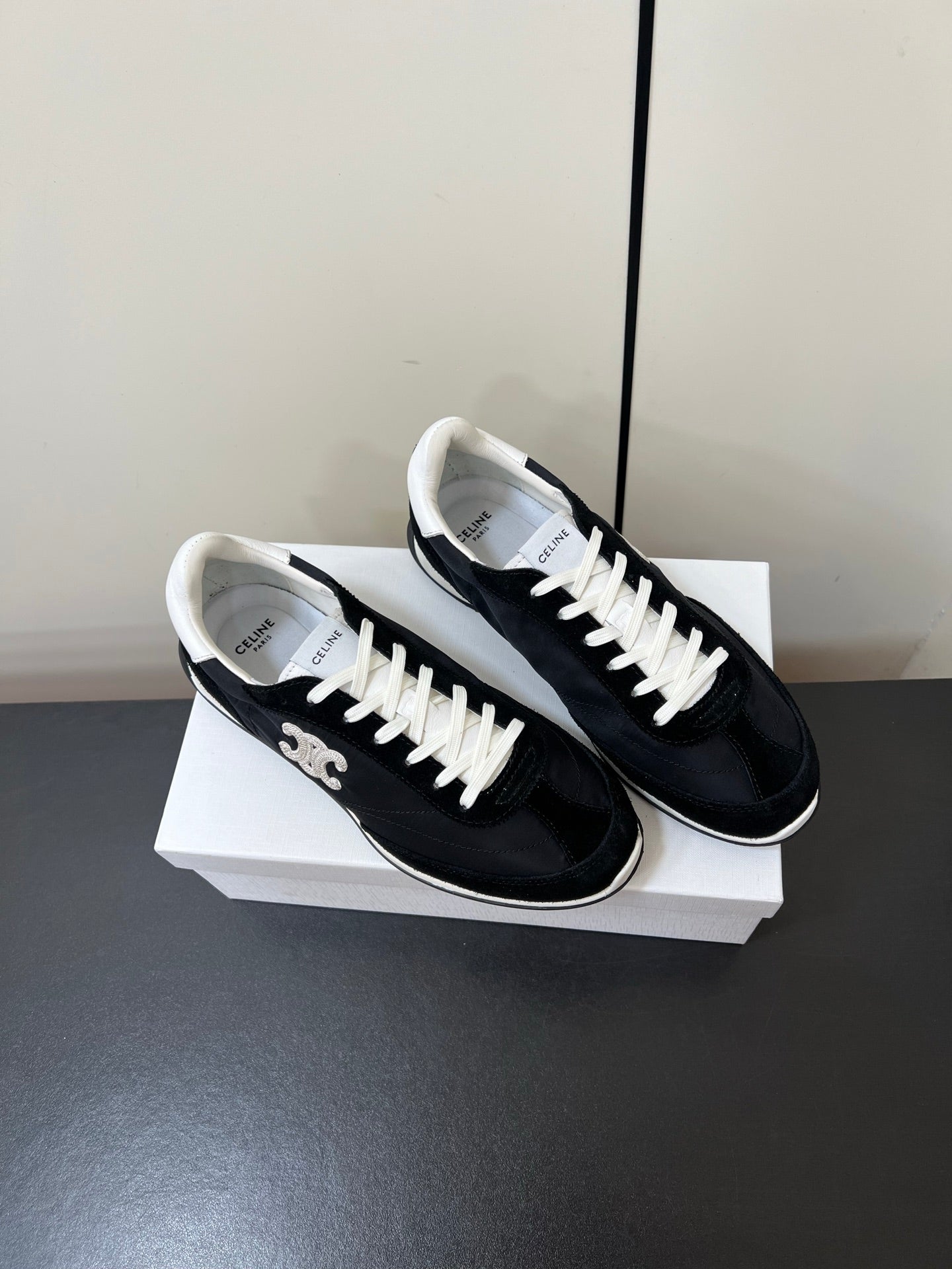 CELINE 25S RACER FORREST GUMP SNEAKERS IN BLACK MERCERIZED CALFSKIN