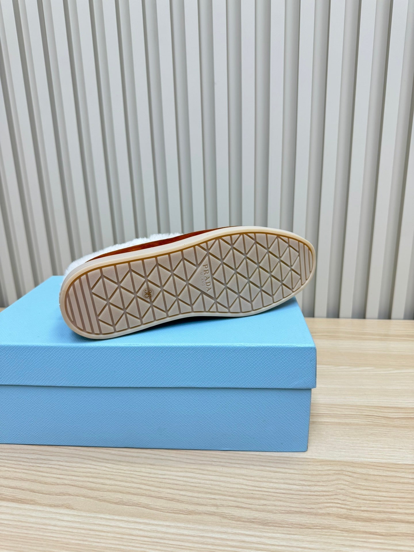 LOAFER IN RED BROWN SUEDE AND FUR LINING ATTACHED TRIANGLE LOGO